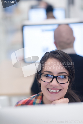 Image of startup business, woman  working on desktop computer