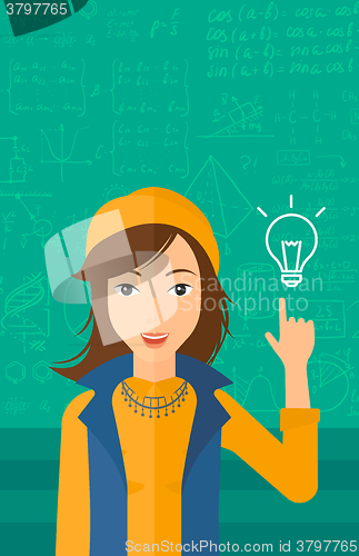 Image of Woman pointing at light bulb.