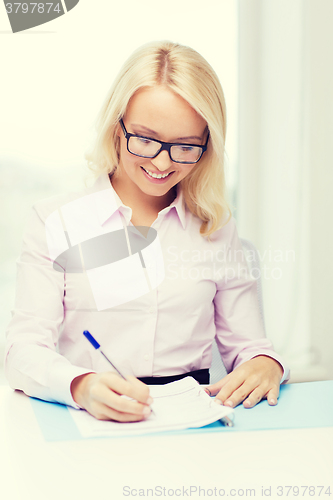 Image of smiling businesswoman or student with laptop