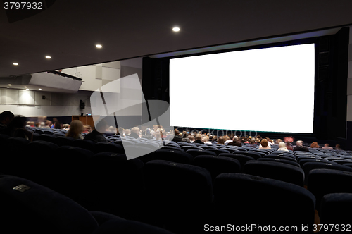 Image of Cinema auditorium with people.