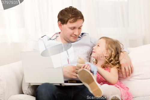 Image of Daughter wants to play with busy dad