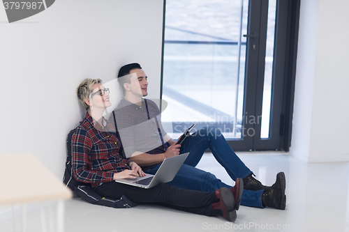 Image of startup business, couple working on laptop computer at office