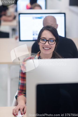 Image of startup business, woman  working on desktop computer