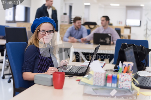 Image of startup business, woman  working on laptop