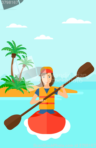 Image of Woman riding in canoe.