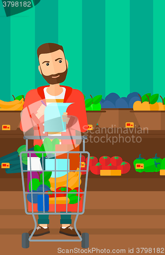 Image of Man with shopping list. 