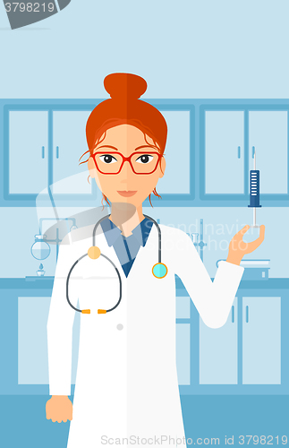 Image of Doctor with syringe in laboratory.