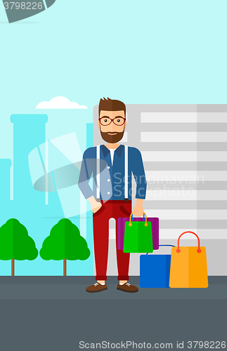 Image of Buyer with shopping bags.