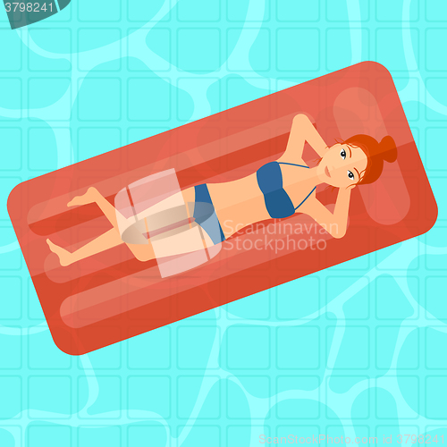 Image of Woman relaxing in swimming pool.