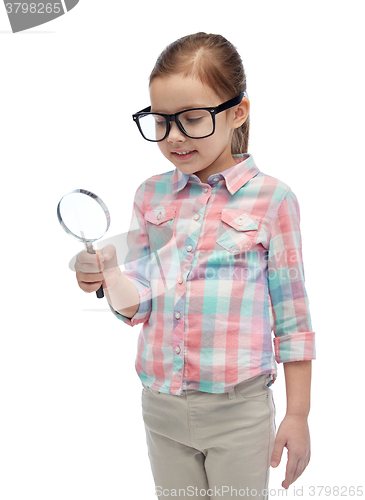 Image of little girl in eyeglasses with magnifying glass