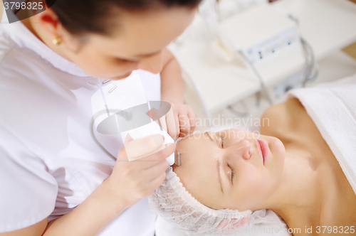 Image of Ultrasonic face cleaning at the beauty spa