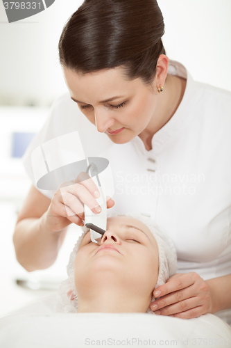Image of Ultrasonic facial cleaning at beauty treatment salon