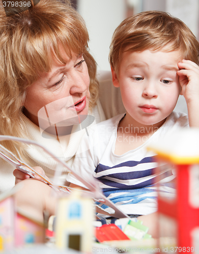 Image of Grandma and puzzled boy