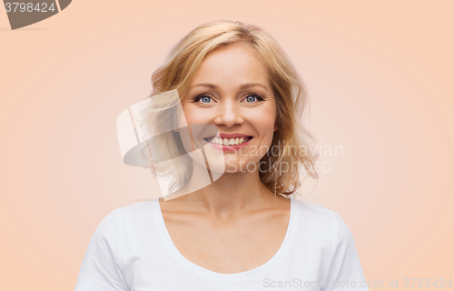 Image of smiling woman in blank white t-shirt