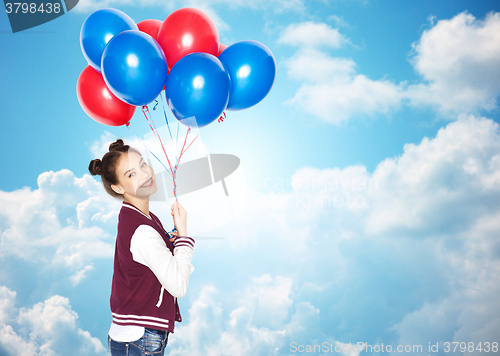 Image of happy teenage girl with helium balloons