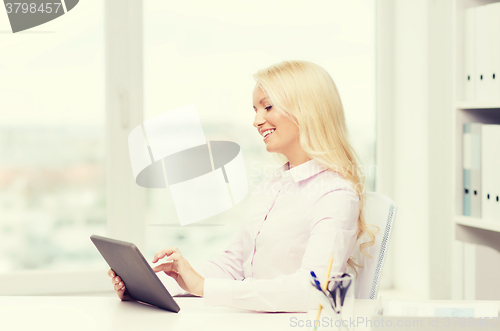 Image of smiling businesswoman or student with tablet pc