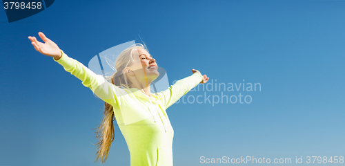 Image of woman doing sports outdoors