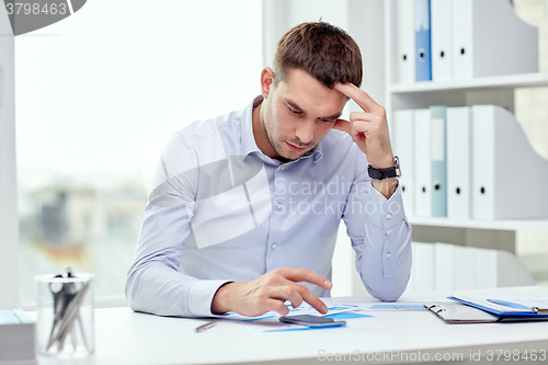 Image of close up of businessman with smartphone
