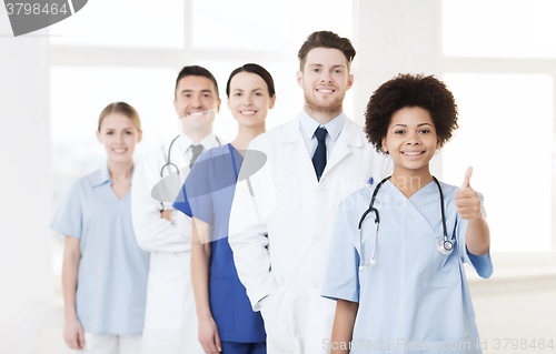 Image of group of happy doctors at hospital