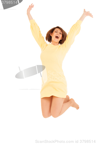 Image of Smiling adult woman jumping with hands up