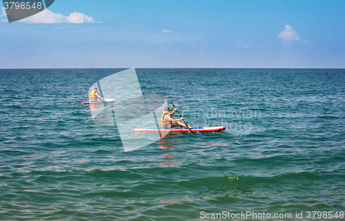 Image of A walk along the sea on small boats.