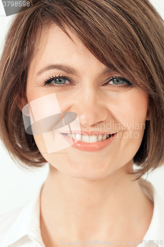 Image of Headshot of adult woman with toothy smile.