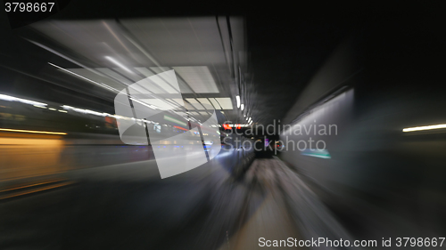 Image of Reflection of subway tunnel in train\'s window