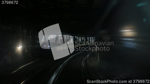 Image of Paris train moving toward end of tunnel