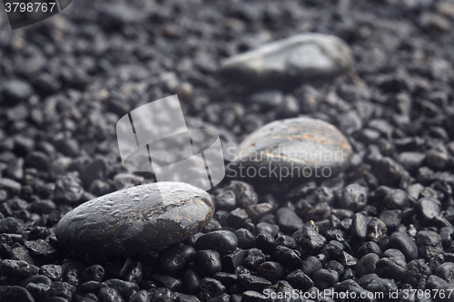 Image of Red heart on white stone