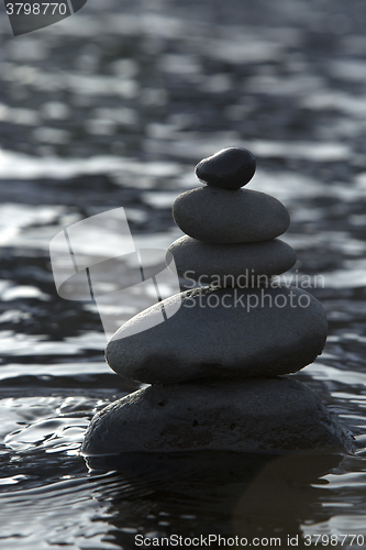Image of Stacked stones in water