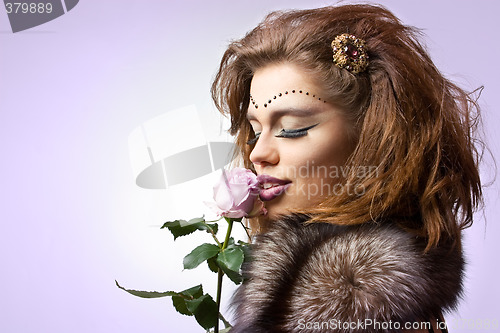 Image of beauty with rose