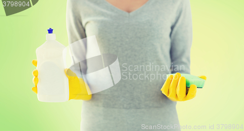 Image of close up of woman with sponge and cleanser