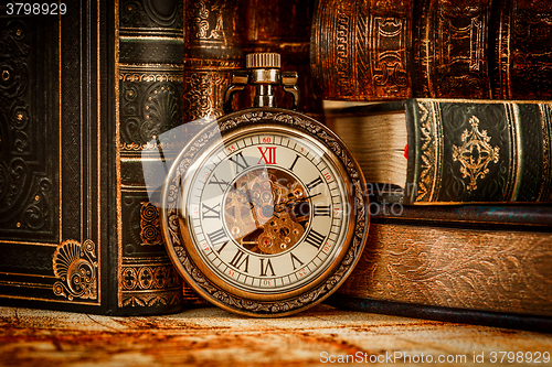 Image of Old Books and Vintage pocket watch