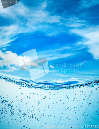 Image of Close up water on a background of blue sky