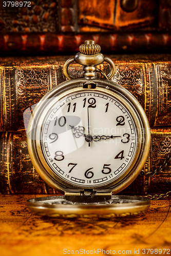 Image of Old Books and Vintage pocket watch