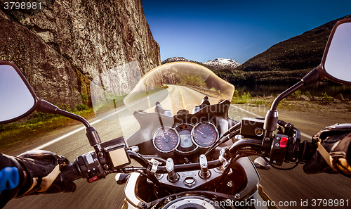 Image of Biker First-person view, mountain serpentine.