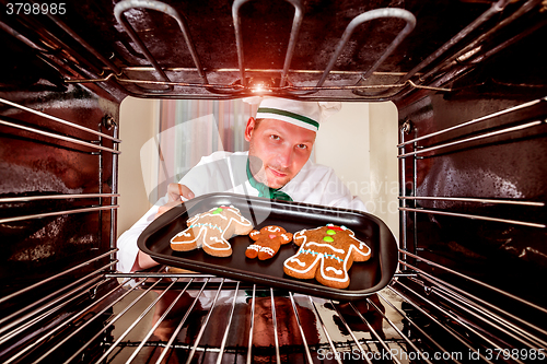 Image of Baking Gingerbread man in the oven