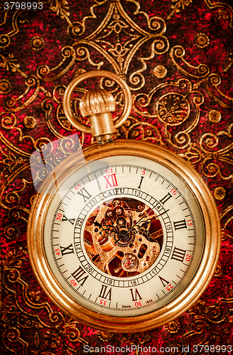 Image of Old Books and Vintage pocket watch