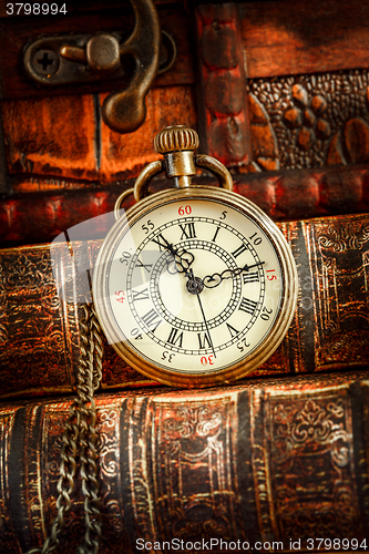 Image of Old Books and Vintage pocket watch