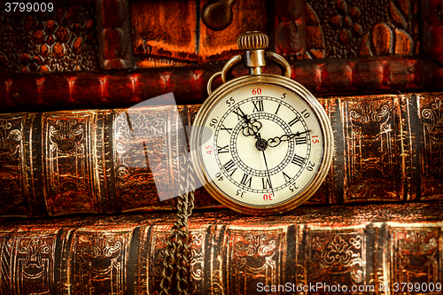 Image of Old Books and Vintage pocket watch