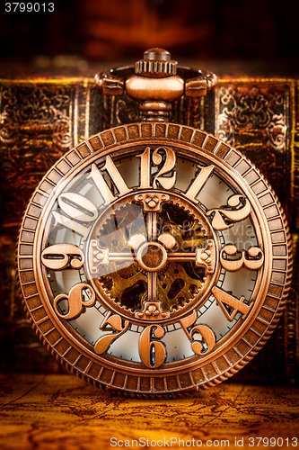 Image of Old Books and Vintage pocket watch