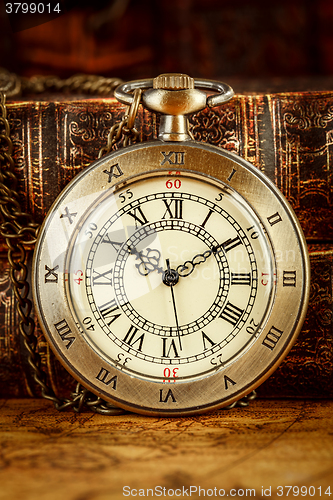 Image of Old Books and Vintage pocket watch