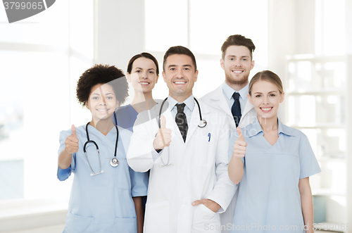 Image of group of happy doctors at hospital