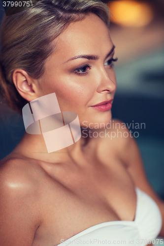 Image of close up of woman in swimsuit at swimming pool