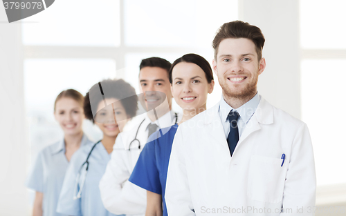 Image of group of happy doctors at hospital