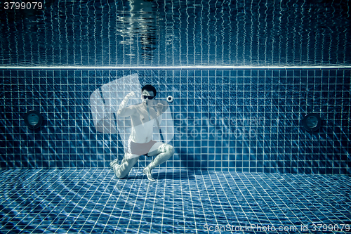 Image of Underwater pool portraying Superman