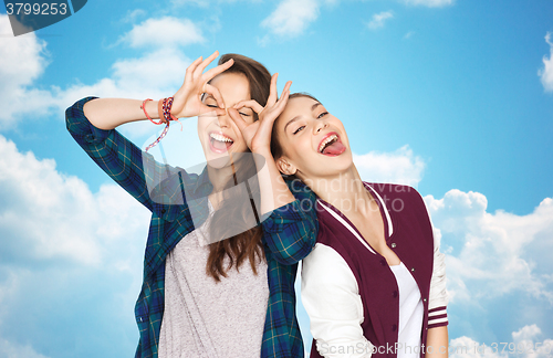 Image of happy smiling pretty teenage girls having fun