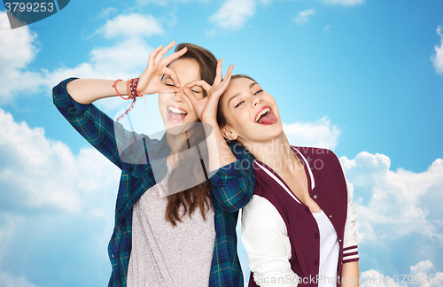 Image of happy smiling pretty teenage girls having fun