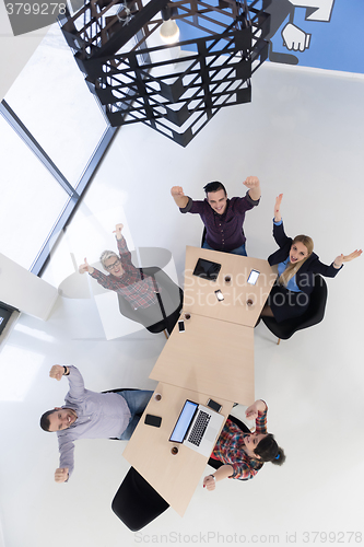 Image of aerial view of business people group on meeting