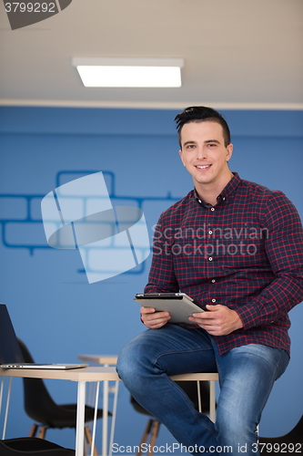 Image of young startup business man portrait at modern office